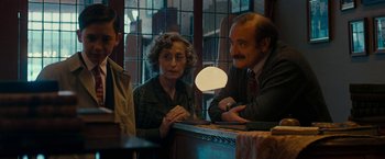 Movie still from “Pawn Sacrifice” (2014), directed by Edward Zwick – A man and a woman sitting at a counter; Medium shot, Over the shoulder angle