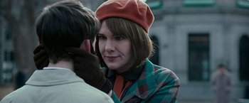 Movie still from “Pawn Sacrifice” (2014), directed by Edward Zwick – A woman wearing a red hat and a plaid shirt; Close Up shot, Over the shoulder angle