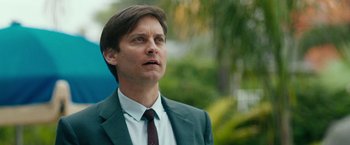 Movie still from “Pawn Sacrifice” (2014), directed by Edward Zwick – A person wearing a suit and tie; Close Up shot, Low angle