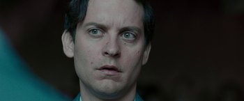 Movie still from “Pawn Sacrifice” (2014), directed by Edward Zwick – A person with green eyes; Close Up shot, Low angle