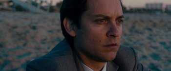 Movie still from “Pawn Sacrifice” (2014), directed by Edward Zwick – A person wearing a suit and tie; Close Up shot, Low angle