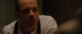 Movie still from “Pawn Sacrifice” (2014), directed by Edward Zwick – A person wearing a shirt and tie; Close Up shot, Over the shoulder angle