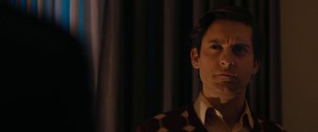 Movie still from “Pawn Sacrifice” (2014), directed by Edward Zwick – A person wearing a shirt and tie; Close Up shot, Low angle