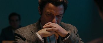 Movie still from “Pawn Sacrifice” (2014), directed by Edward Zwick – A person wearing a suit and tie; Close Up shot, High angle