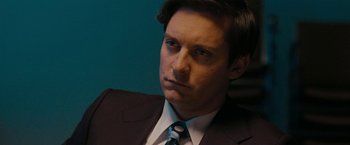 Movie still from “Pawn Sacrifice” (2014), directed by Edward Zwick – A person wearing a suit and tie; Close Up shot, Low angle