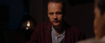 Movie still from “Pawn Sacrifice” (2014), directed by Edward Zwick – A person wearing a jacket; Close Up shot, Over the shoulder angle