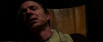 Movie still from “Pearl” (2022), directed by Ti West – A person's face in a room; Close Up shot, Low angle