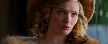 Movie still from “Pearl” (2022), directed by Ti West – A person with a hat; Close Up shot, Over the shoulder angle