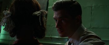 Movie still from “Pearl” (2022), directed by Ti West – A man and a woman looking at each other; Close Up shot, Over the shoulder angle
