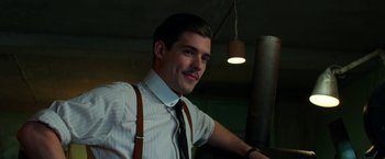 Movie still from “Pearl” (2022), directed by Ti West – A man in a white dress shirt and brown suspenders; Close Up shot, Low angle