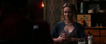 Movie still from “Pearl” (2022), directed by Ti West – A beautiful young lady sitting in front of a bathroom mirror; Close Up shot, Over the shoulder angle