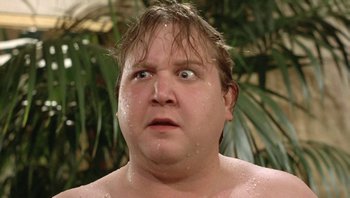 Movie still from “Pee-wee's Big Adventure” (1985), directed by Tim Burton – A person with wet hair; Close Up shot, Low angle