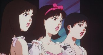 Movie still from “Perfect Blue” (1997), directed by Kô Matsuo – A group of anime girls singing into microphones; Close Up shot, Low angle
