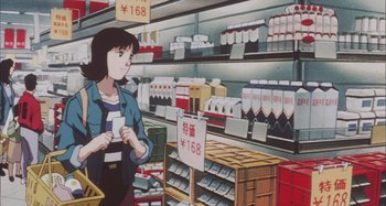 Movie still from “Perfect Blue” (1997), directed by Kô Matsuo – A woman is standing in front of shelves of drinks; Medium shot, Low angle
