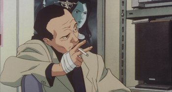 Movie still from “Perfect Blue” (1997), directed by Kô Matsuo – An animated man smoking a cigarette in front of a woman; Close Up shot, Low angle