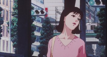 Movie still from “Perfect Blue” (1997), directed by Kô Matsuo – An animated picture of a woman in a pink shirt; Close Up shot, Low angle