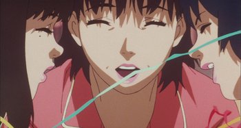 Movie still from “Perfect Blue” (1997), directed by Kô Matsuo – A woman's face with long hair; Extreme Close Up shot, Overhead angle