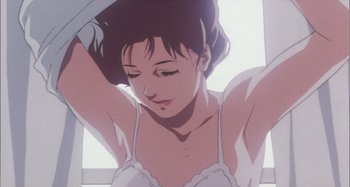 Movie still from “Perfect Blue” (1997), directed by Kô Matsuo – A person in a white bra; Close Up shot, Low angle