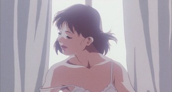 Movie still from “Perfect Blue” (1997), directed by Kô Matsuo – A girl is looking out the window while holding a phone; Close Up shot, Low angle