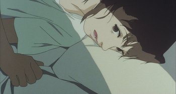 Movie still from “Perfect Blue” (1997), directed by Kô Matsuo – An animated picture of a woman laying on the ground; Extreme Close Up shot, Overhead angle