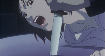 Movie still from “Perfect Blue” (1997), directed by Kô Matsuo – An animated picture of a woman holding a knife in her mouth; Extreme Close Up shot, Overhead angle