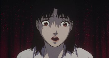 Movie still from “Perfect Blue” (1997), directed by Kô Matsuo – An animated picture of a woman with a surprised look on her face; Close Up shot, Low angle