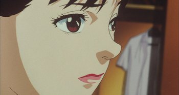 Movie still from “Perfect Blue” (1997), directed by Kô Matsuo – Picture of a woman's face; Extreme Close Up shot, Low angle