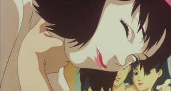 Movie still from “Perfect Blue” (1997), directed by Kô Matsuo – A woman's face in a cartoon; Extreme Close Up shot, Overhead angle