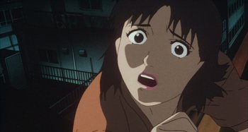 Movie still from “Perfect Blue” (1997), directed by Kô Matsuo – An animated woman looking surprised at the camera; Close Up shot, Low angle