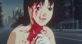 Movie still from “Perfect Blue” (1997), directed by Kô Matsuo – A woman with blood all over her face and chest; Close Up shot, High angle