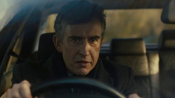 Movie still from “Philomena” (2013), directed by Stephen Frears – A person sitting in a car driving; Close Up shot, Over the shoulder angle