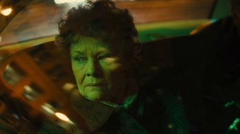 Movie still from “Philomena” (2013), directed by Stephen Frears – An older woman is looking at the camera; Close Up shot, High angle