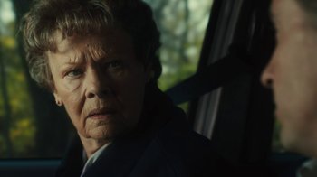 Movie still from “Philomena” (2013), directed by Stephen Frears – An older woman sitting in a car looking out the window; Close Up shot, Over the shoulder angle