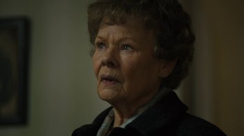 Movie still from “Philomena” (2013), directed by Stephen Frears – An older woman with blue eyes stares into the distance; Close Up shot, Low angle