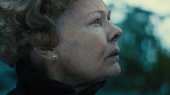Movie still from “Philomena” (2013), directed by Stephen Frears – An older woman looking off into the distance; Close Up shot, Low angle