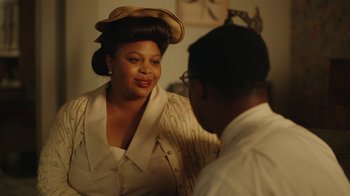 Movie still from “A League of Their Own” (2022), created by Abbi Jacobson – A man and a woman talking to each other; Close Up shot, Over the shoulder angle