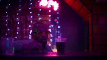Movie still from “Full Circle” (2023), directed by Steven Soderbergh – Medium shot, Low angle
