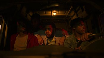 Movie still from “Full Circle” (2023), directed by Steven Soderbergh – Medium shot, Low angle