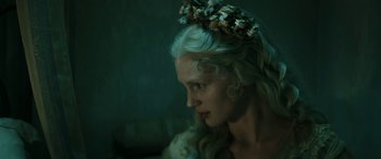 Movie still from “Pinocchio” (2019), directed by Matteo Garrone – A person wearing a crown; Close Up shot, High angle