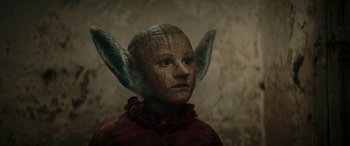 Movie still from “Pinocchio” (2019), directed by Matteo Garrone – A doll's face with ears; Close Up shot, Low angle