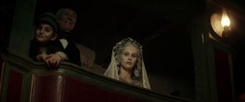 Movie still from “Pinocchio” (2019), directed by Matteo Garrone – A woman's face with a veil on; Close Up shot, Over the shoulder angle