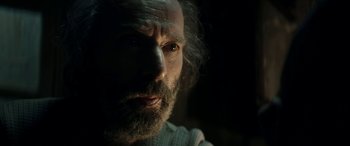 Movie still from “Pinocchio” (2019), directed by Matteo Garrone – A person with a beard; Close Up shot, Low angle