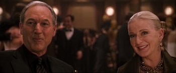 Movie still from “Poseidon” (2006), directed by Wolfgang Petersen – A group of people standing in a room; Close Up shot, Over the shoulder angle