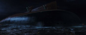 Movie still from “Poseidon” (2006), directed by Wolfgang Petersen – A boat in the water at night time; Extreme Wide shot, Overhead angle