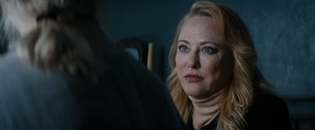 Movie still from “Prey for the Devil” (2022), directed by Daniel Stamm – A person sitting in front of another person; Close Up shot, Over the shoulder angle