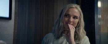 Movie still from “Prey for the Devil” (2022), directed by Daniel Stamm – A woman with grey hair posing for a picture; Close Up shot, Over the shoulder angle