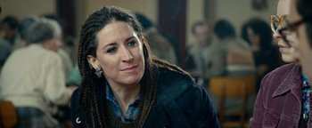 Movie still from “Pride” (2014), directed by Matthew Warchus – A person wearing a jacket; Close Up shot, Over the shoulder angle