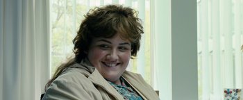 Movie still from “Pride” (2014), directed by Matthew Warchus – A person wearing a jacket; Close Up shot, Over the shoulder angle