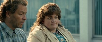 Movie still from “Pride” (2014), directed by Matthew Warchus – A person wearing a jacket; Close Up shot, Over the shoulder angle