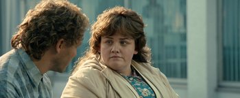 Movie still from “Pride” (2014), directed by Matthew Warchus – A person wearing a jacket; Close Up shot, Over the shoulder angle